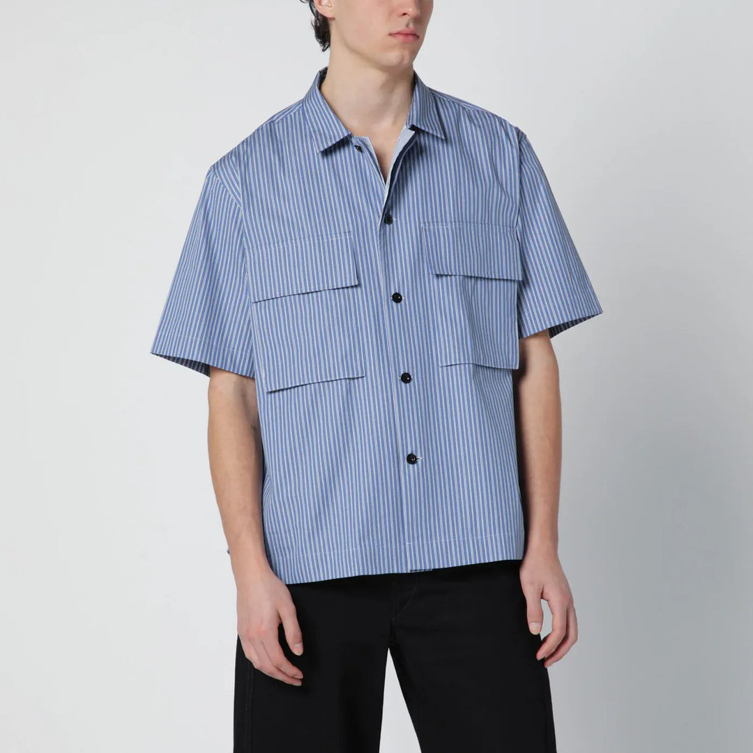 Sacai - Light blue striped cotton shirt Brand Apparel &amp; Accessories > Clothing > Shirts &amp; Tops