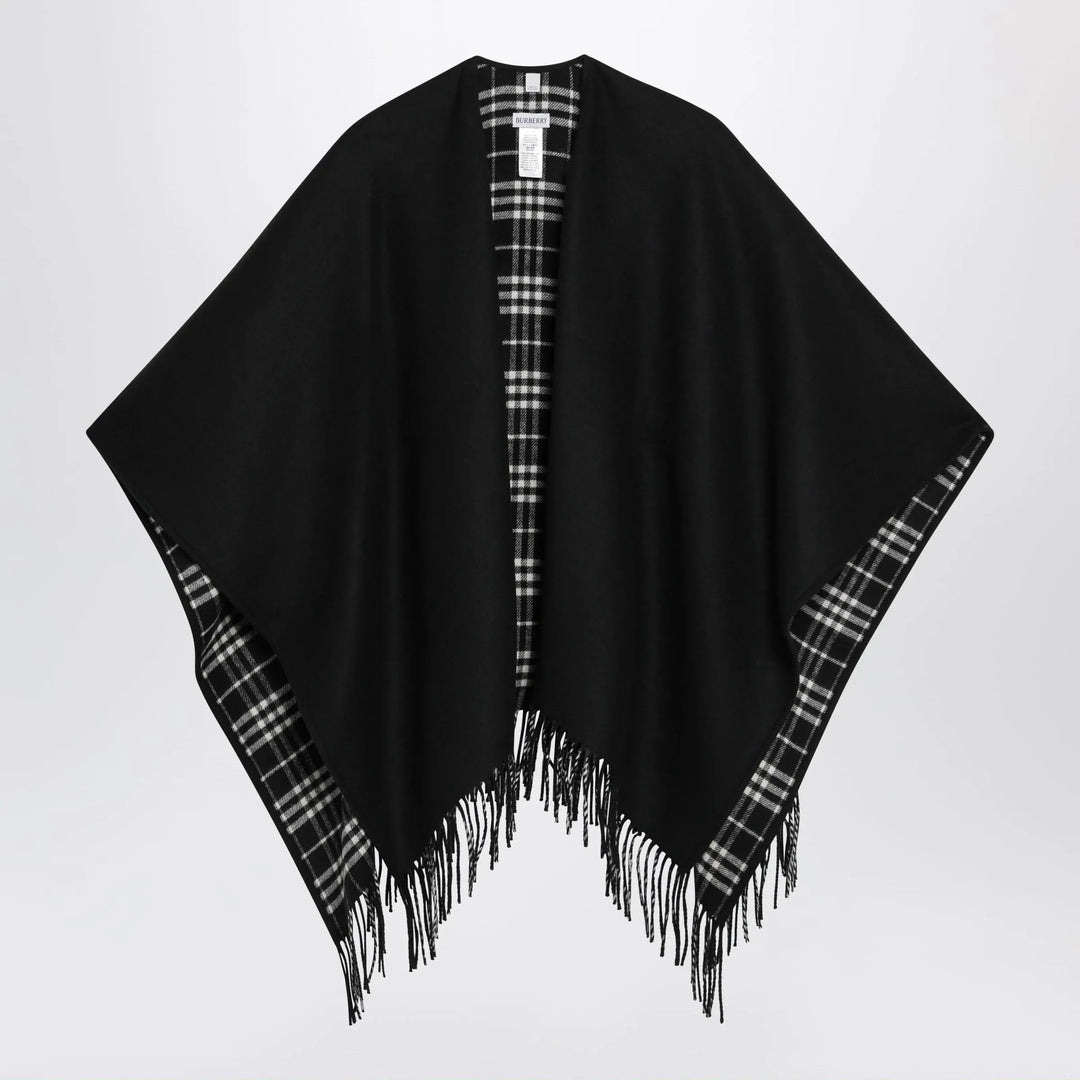 Burberry - Reversible wool check cape with fringes in black Brand Coats &amp; Jackets U
