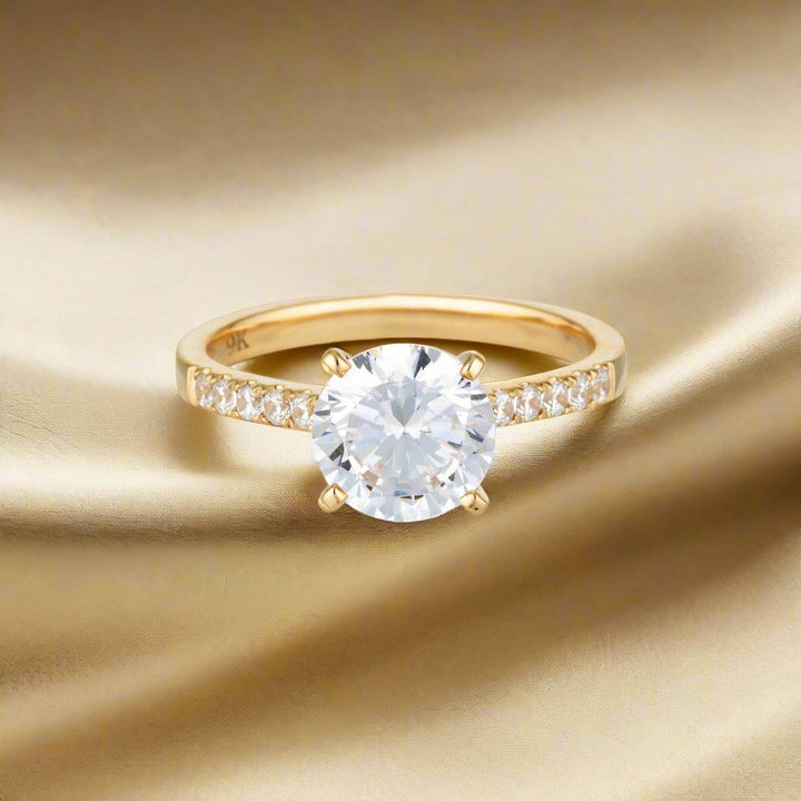 Georgini Ring Georgini Gold Round Brilliant Cut 2ct Moissanite Engagement Ring In 9ct Yellow Gold Georgini Gold Round Brilliant Cut 2ct Moissanite Engagement Ring In 9ct Yellow Gold Brand