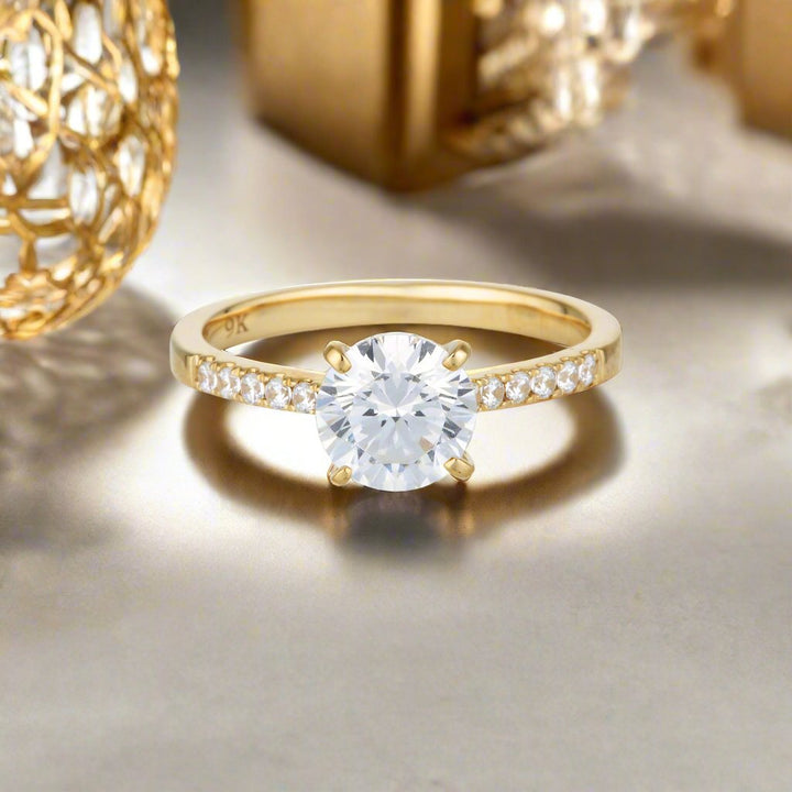 Georgini Gold Round Brilliant Cut In 1.25ctw Moissanite Engagement Ring In 9ct Yellow Gold